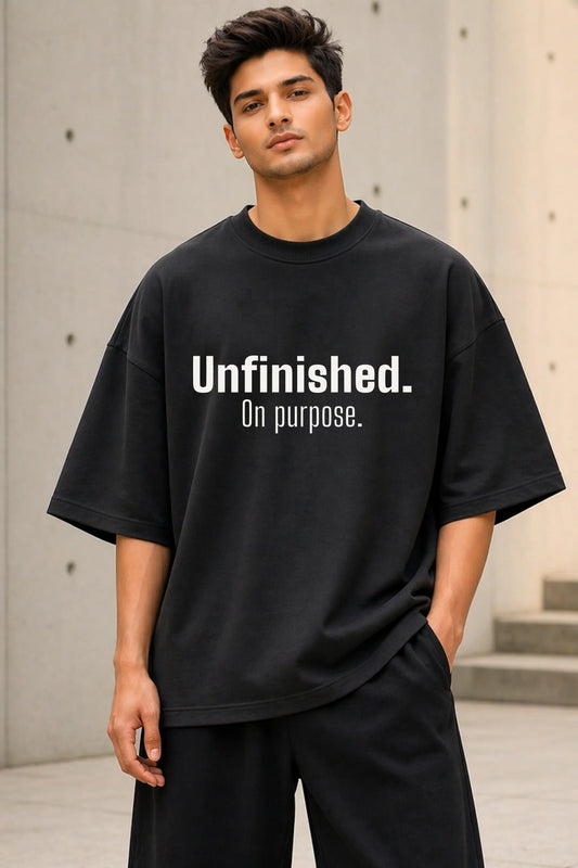 Unfinished On Purpose black oversized tee — men's full-body streetwear look