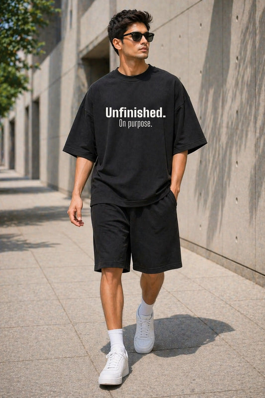 Unfinished On Purpose black oversized tee — men's street lifestyle look with shorts and sneakers